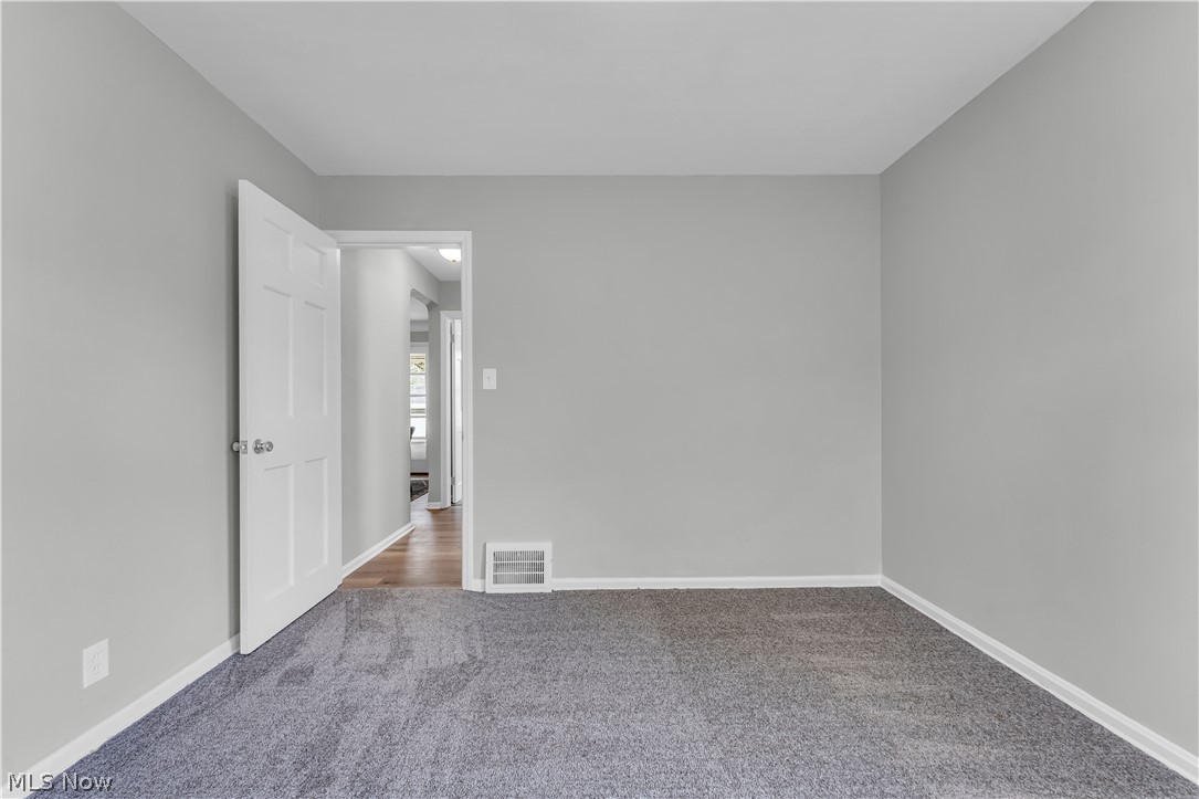 1828 South Green Road Cleveland, OH 44121 - Photo 17 of 30 View of carpeted spare room