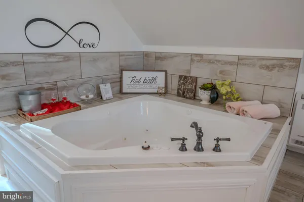 a bathroom with a bathtub