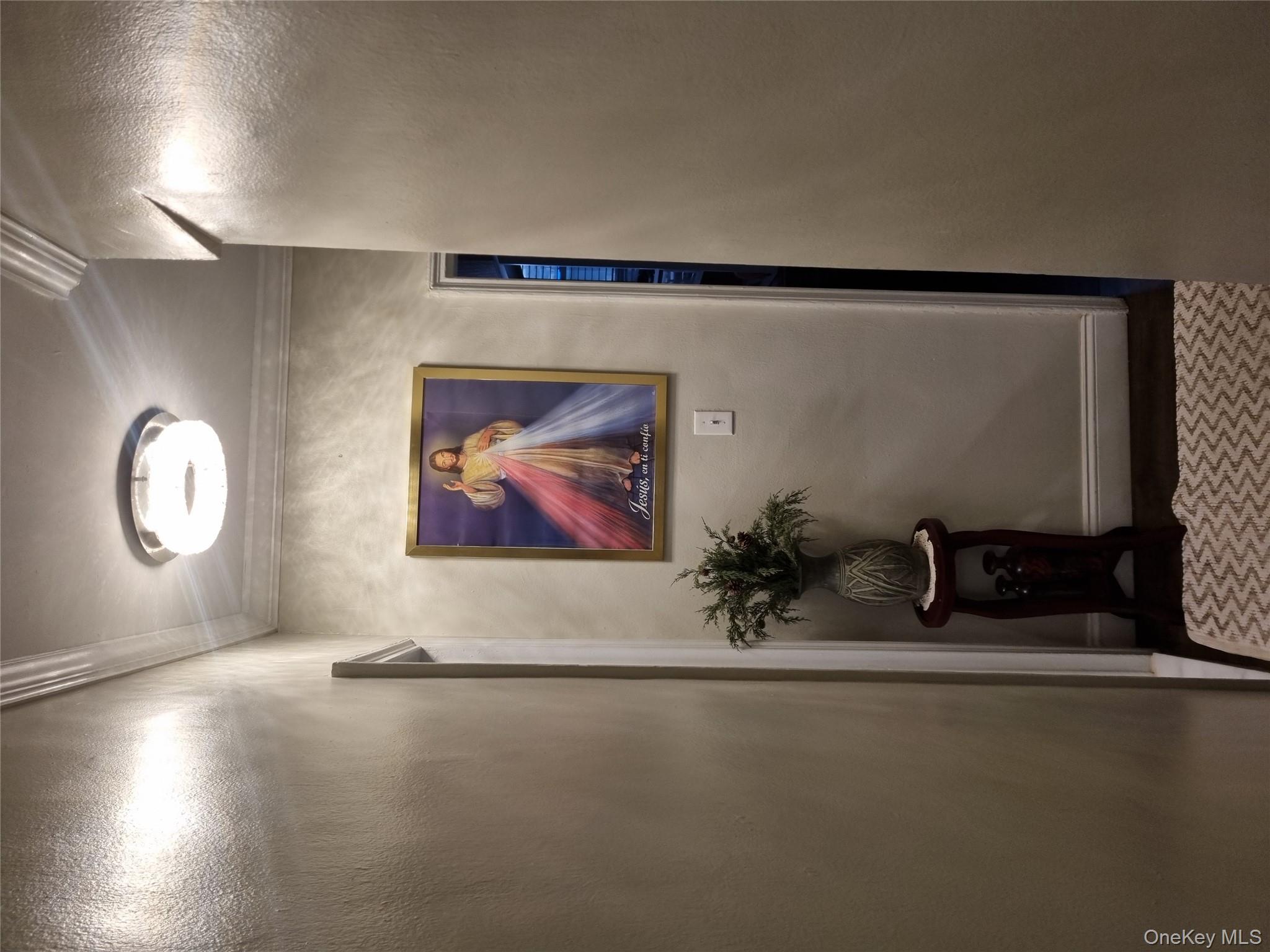 141-34 78th Avenue, Unit 1C Queens, NY 11367 - Photo 11 of 16 Hall featuring ornamental molding and baseboards