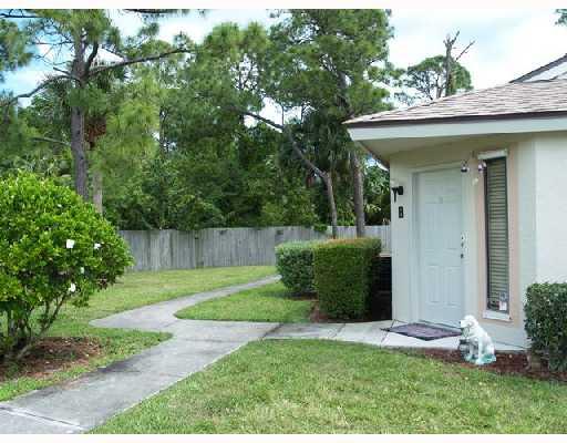 2826 Stoneway Lane, Unit B Fort Pierce, FL 34982 - Photo 7 of 7 a view of a back yard of the house