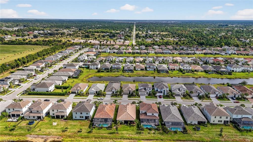 2126 Hamlin Street Naples, FL 34120 - Photo 33 of 38 an aerial view of residential houses with outdoor space