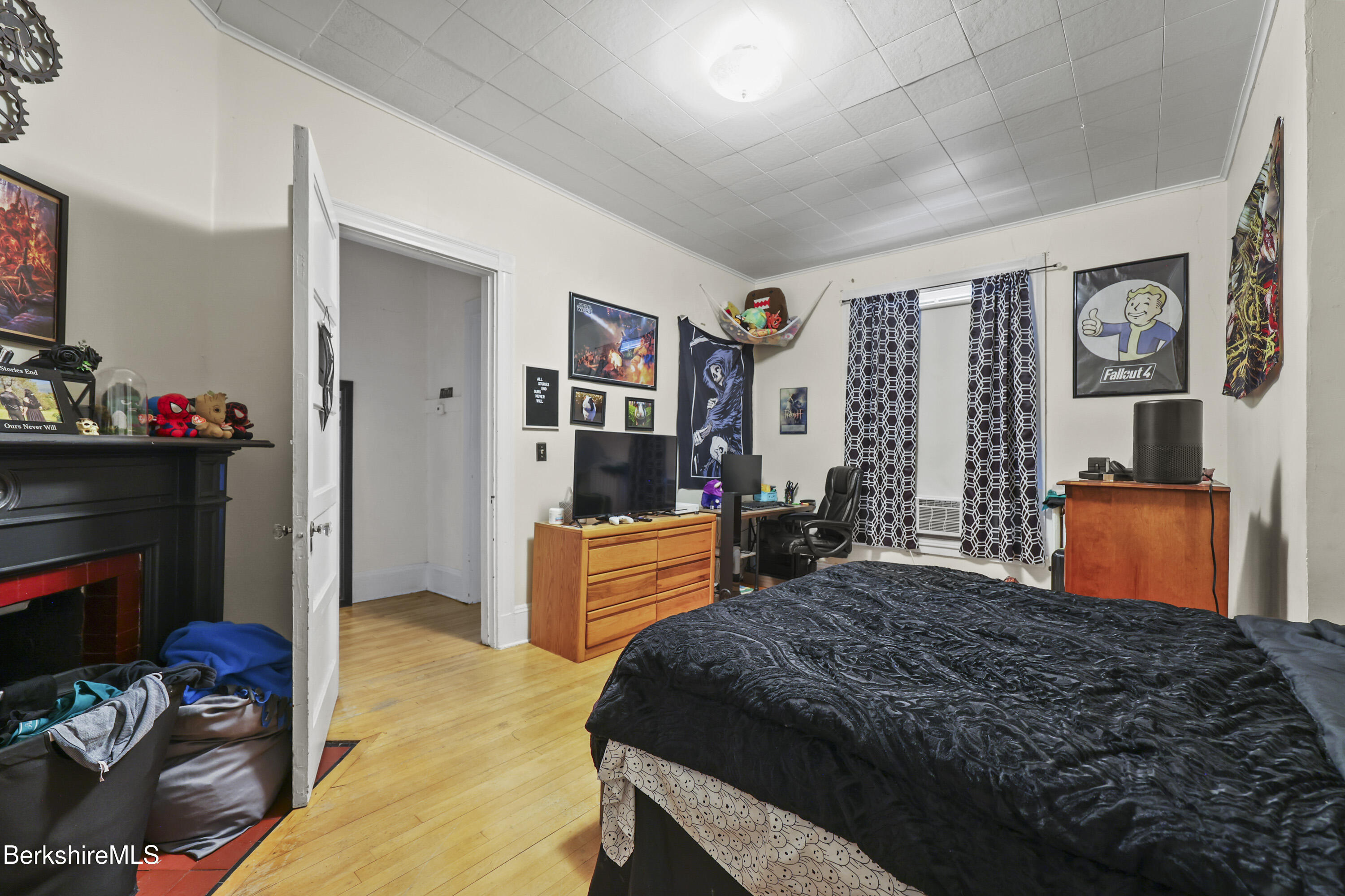 104 Appleton Avenue Pittsfield, MA 01201 - Photo 11 of 50 a bedroom with a bed and a dresser in it