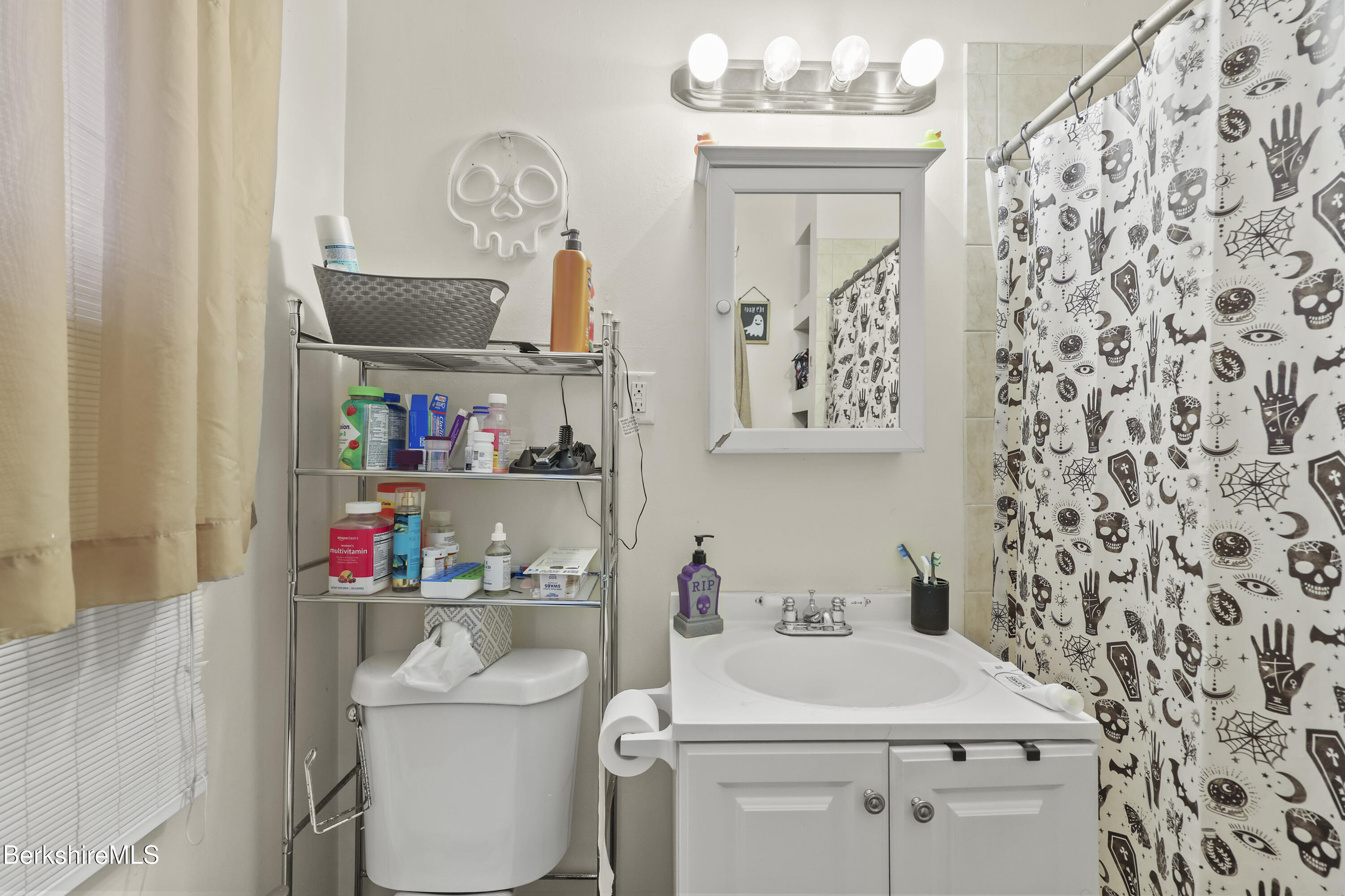 104 Appleton Avenue Pittsfield, MA 01201 - Photo 12 of 50 a bathroom with a sink toilet vanity and tub