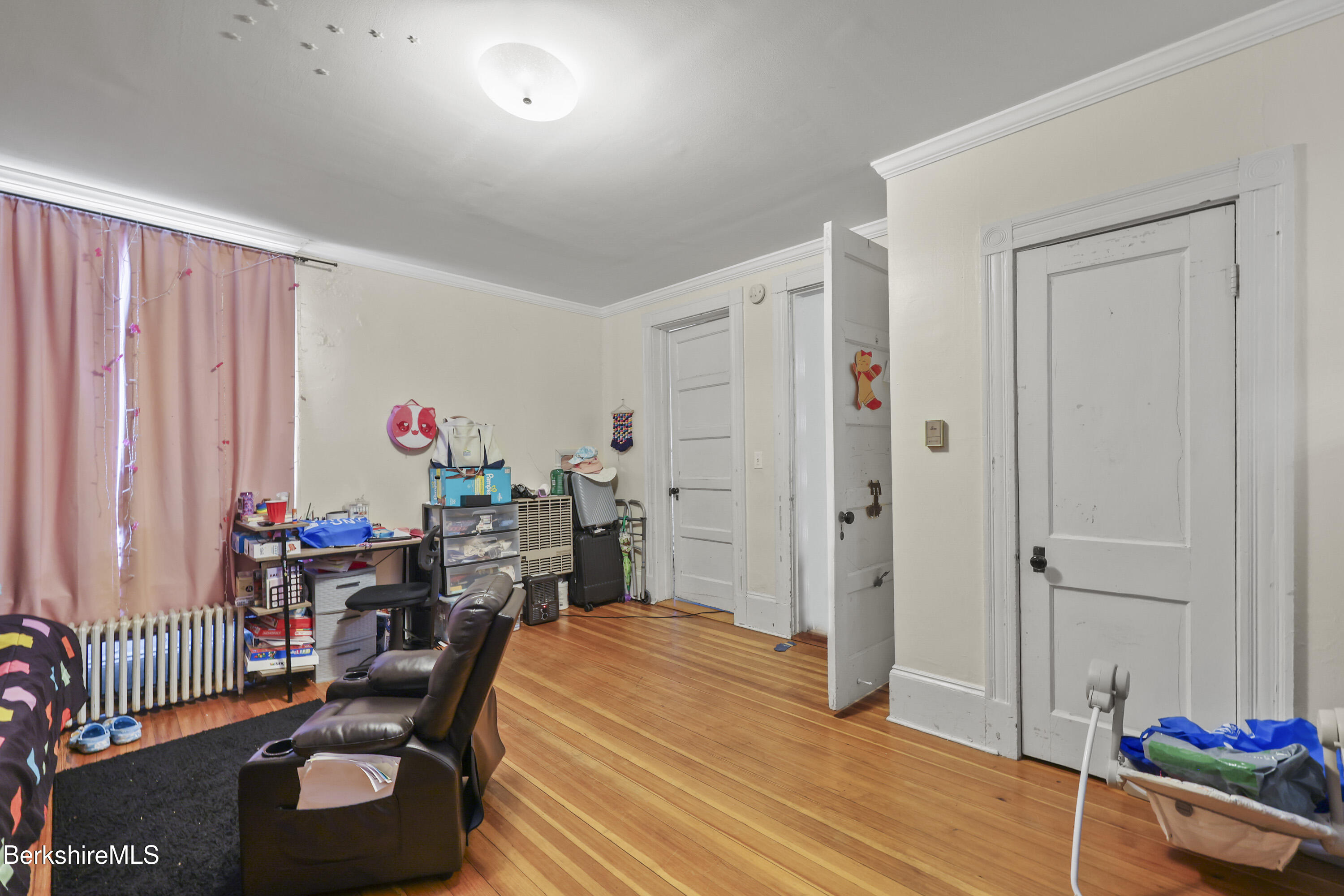 104 Appleton Avenue Pittsfield, MA 01201 - Photo 16 of 50 a living room with furniture and a window