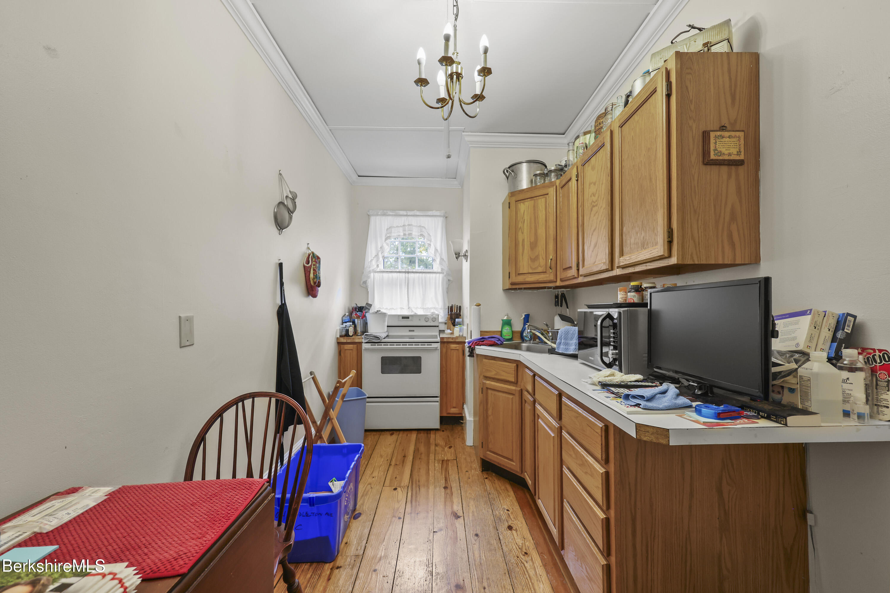 104 Appleton Avenue Pittsfield, MA 01201 - Photo 18 of 50 a view of a workspace with furniture and a window