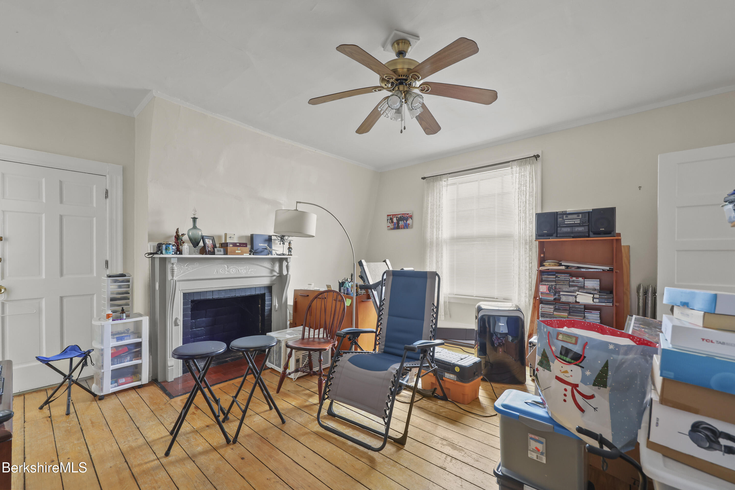 104 Appleton Avenue Pittsfield, MA 01201 - Photo 21 of 50 a work room with furniture and a chandelier