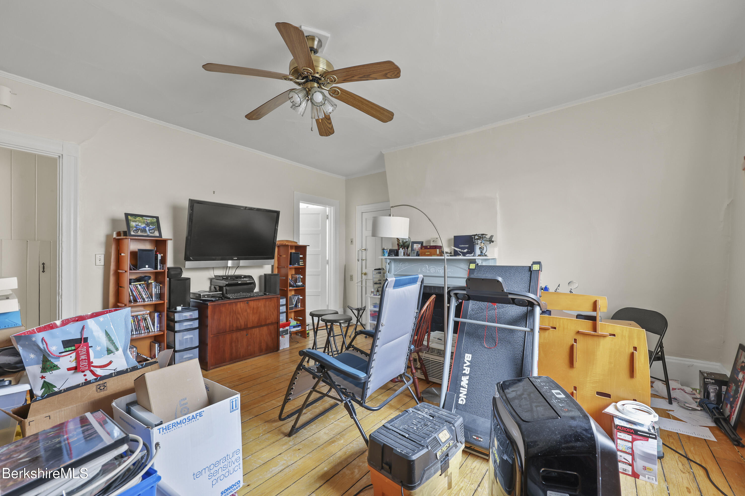 104 Appleton Avenue Pittsfield, MA 01201 - Photo 23 of 50 a view of a workspace with furniture and a flat screen tv