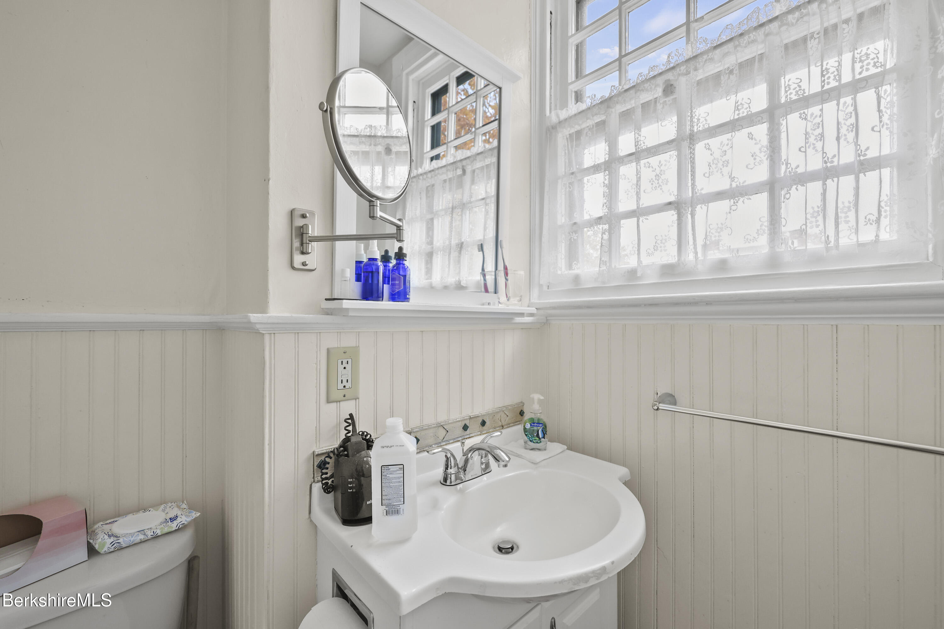 104 Appleton Avenue Pittsfield, MA 01201 - Photo 27 of 50 a bathroom with a sink and a mirror