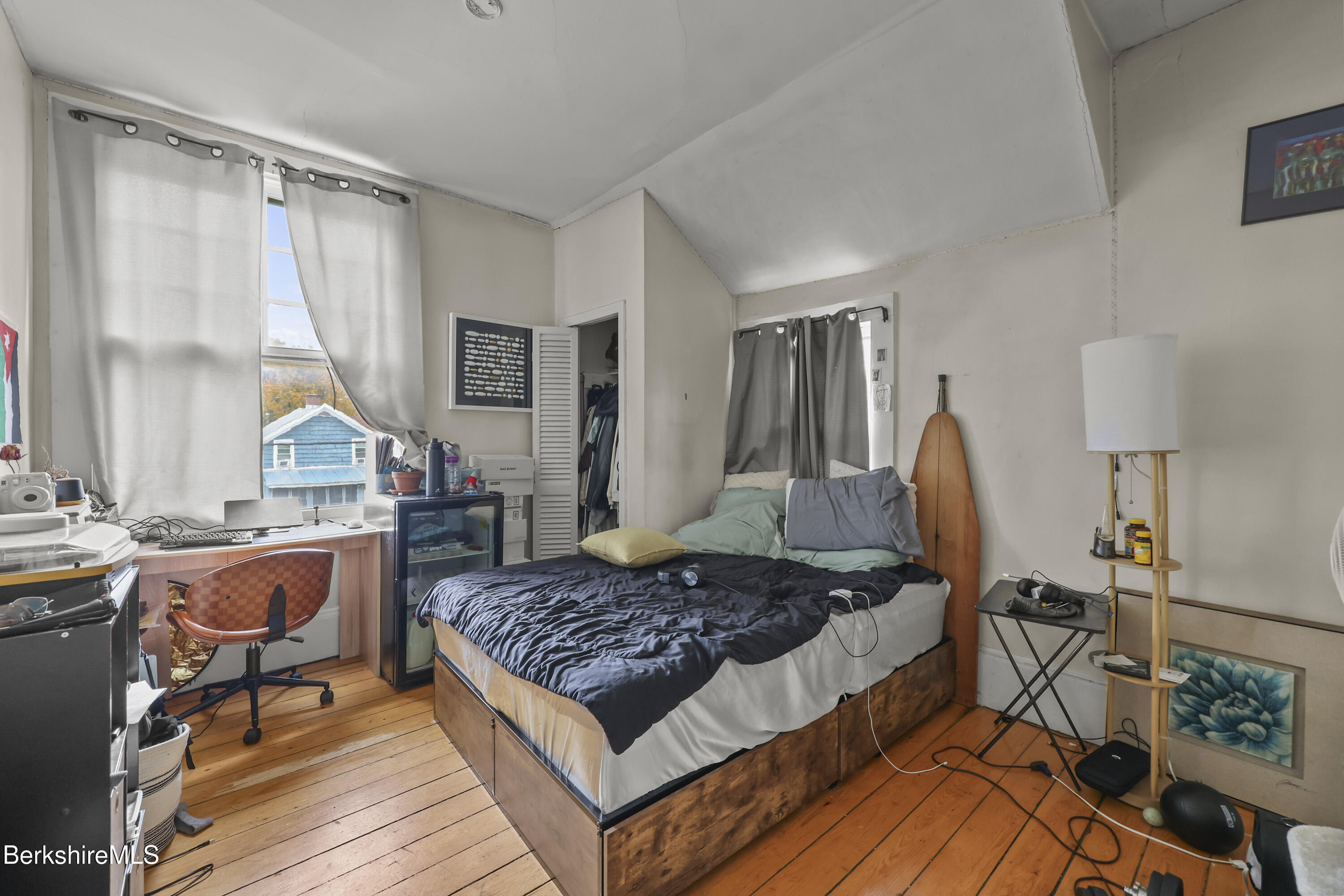 104 Appleton Avenue Pittsfield, MA 01201 - Photo 32 of 50 a bed room with furniture and a window