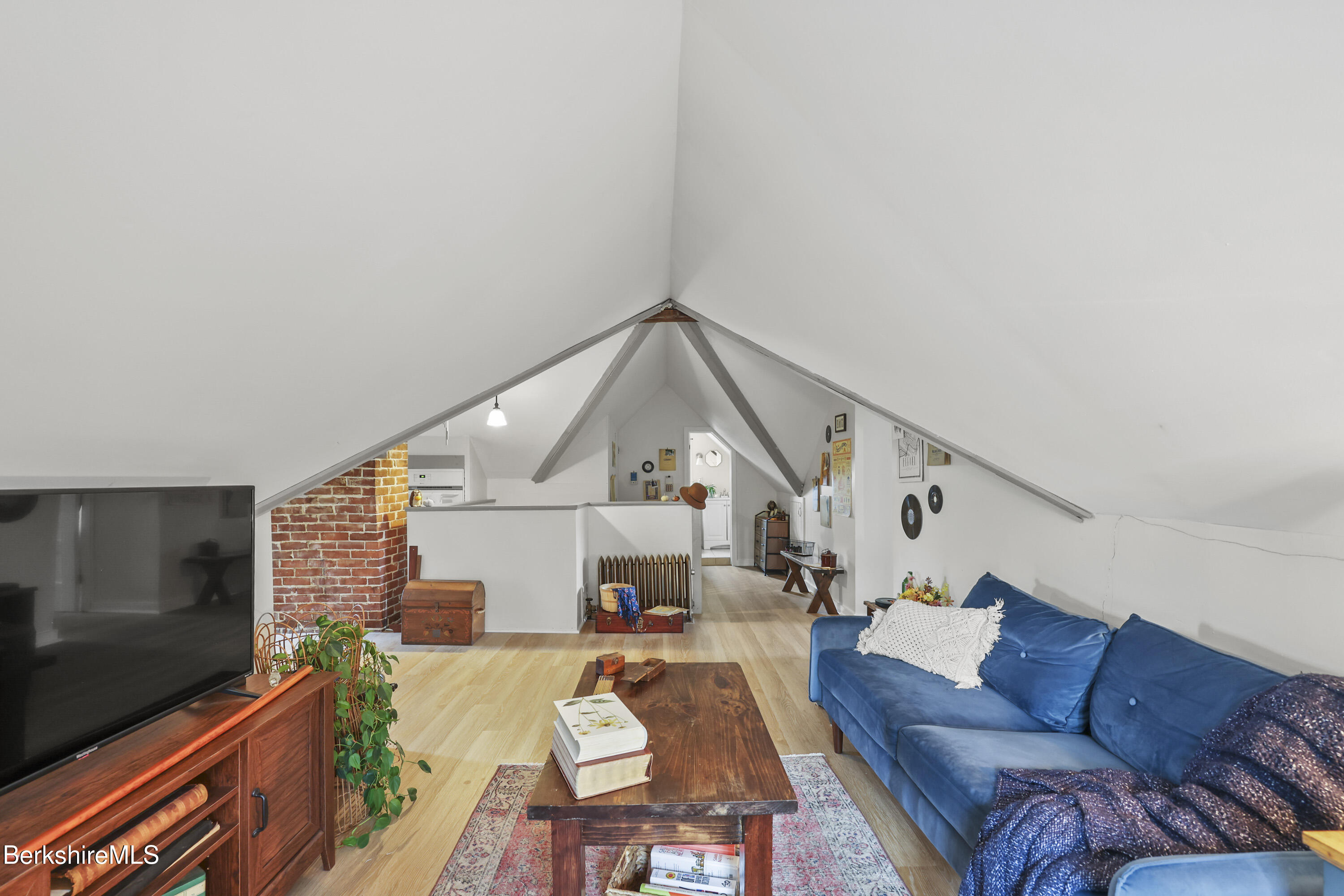 104 Appleton Avenue Pittsfield, MA 01201 - Photo 37 of 50 a living room with furniture and a flat screen tv