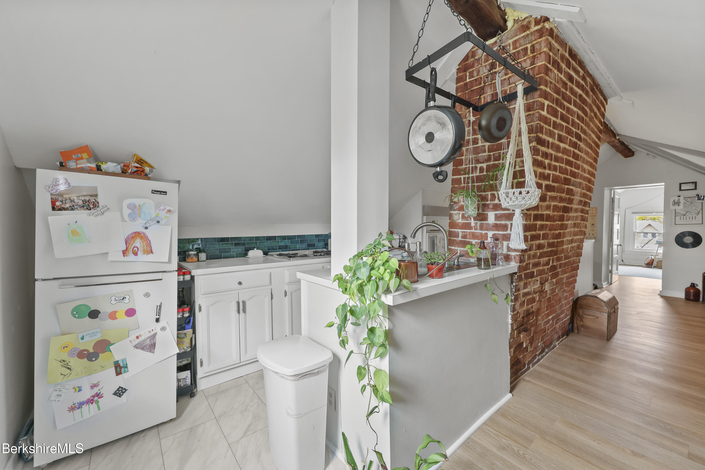 104 Appleton Avenue Pittsfield, MA 01201 - Photo 39 of 50 a kitchen with a refrigerator and a stove