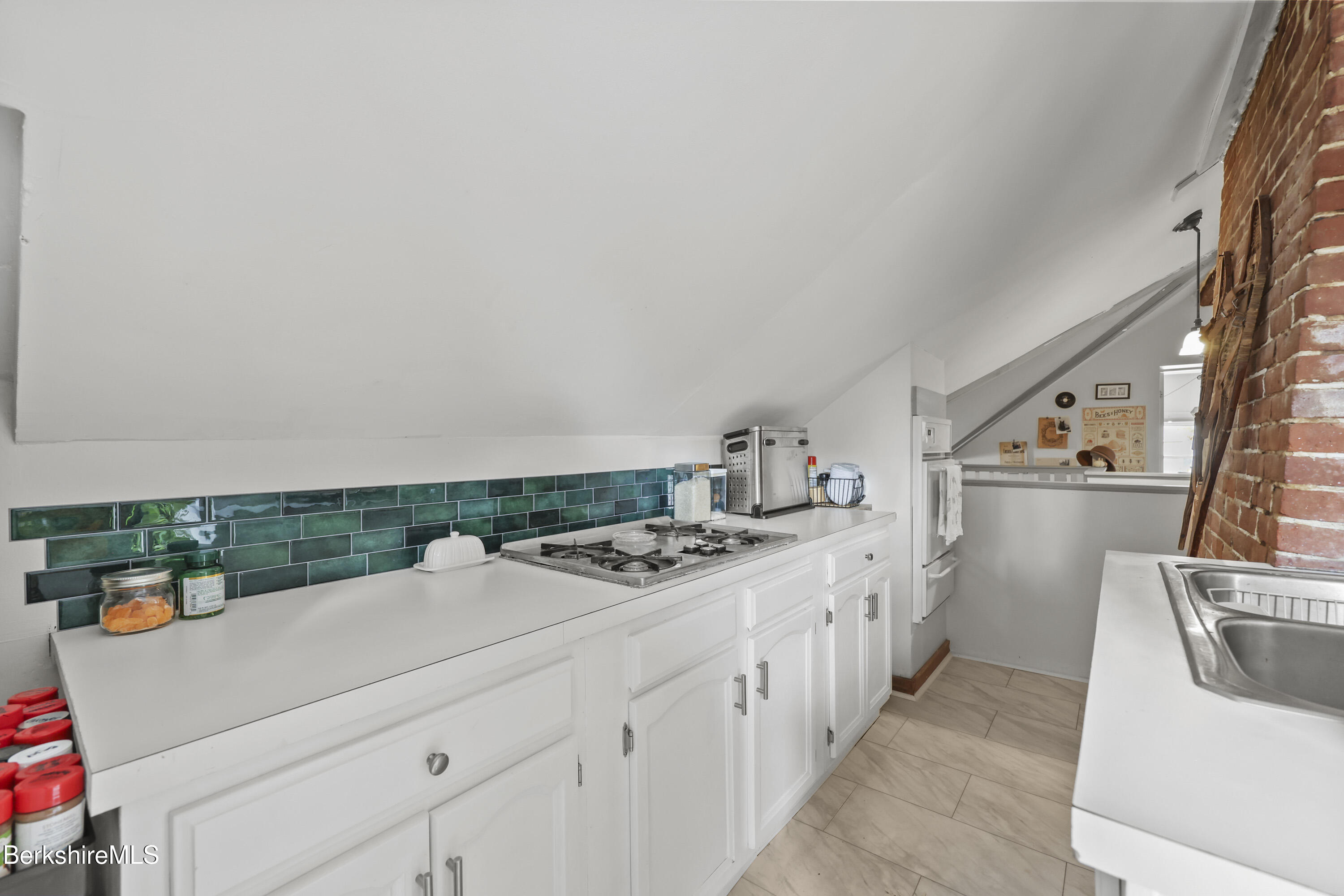 104 Appleton Avenue Pittsfield, MA 01201 - Photo 40 of 50 a kitchen that has a stove and cabinets