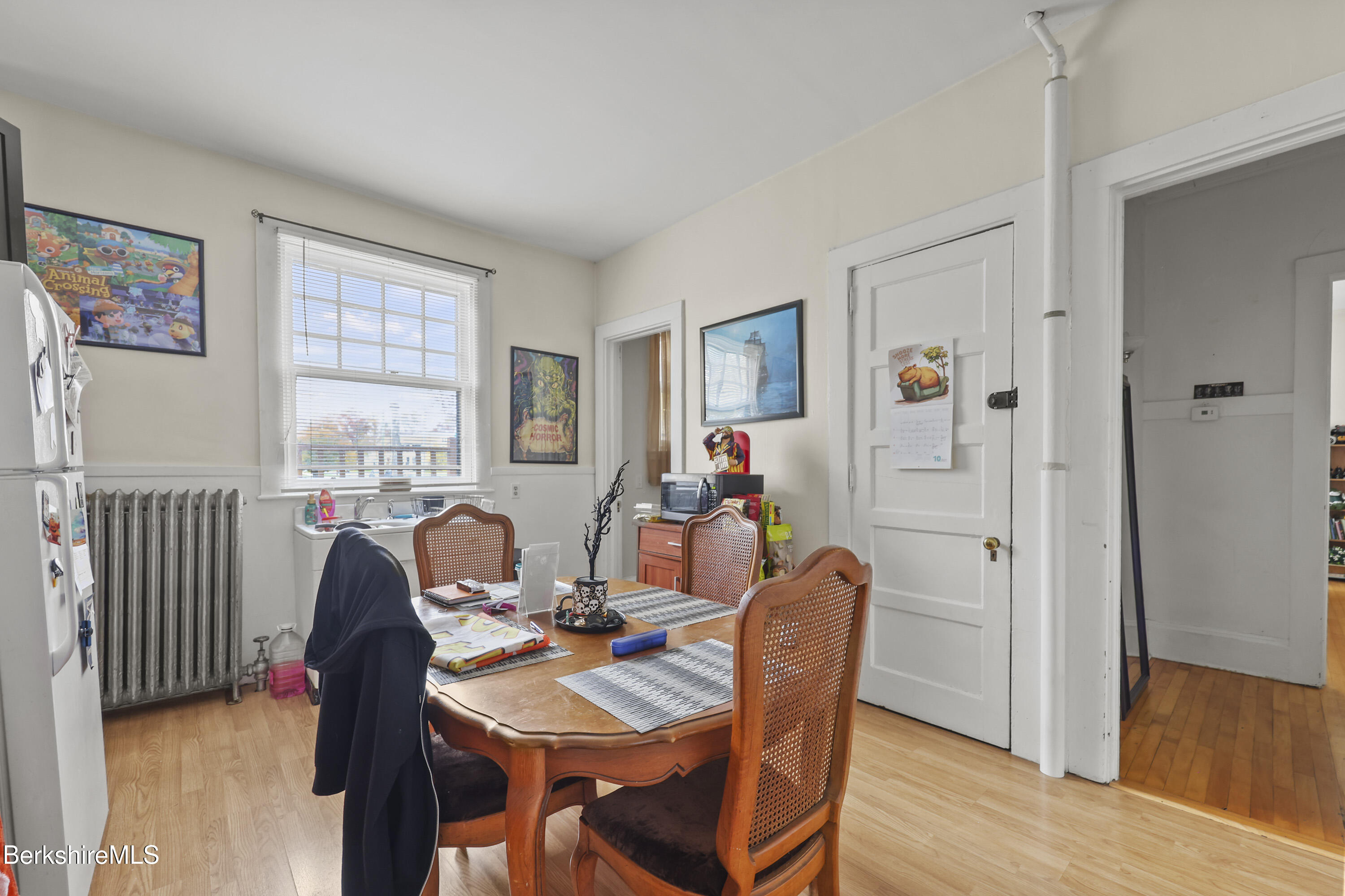104 Appleton Avenue Pittsfield, MA 01201 - Photo 7 of 50 a view of a dining room with furniture and wooden floor