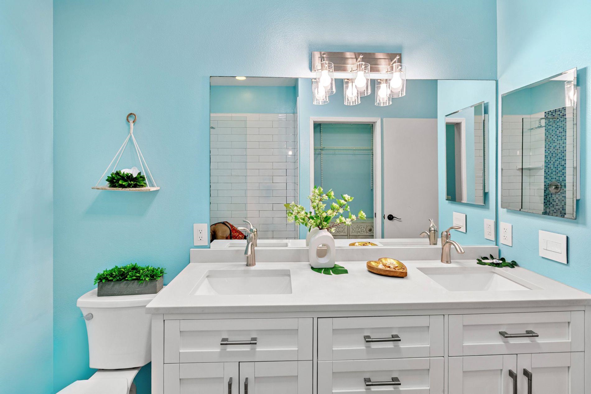 127 Punohu Lane, Unit 72 Lahaina, HI 96761 - Photo 16 of 43 a bathroom with a sink and a mirror