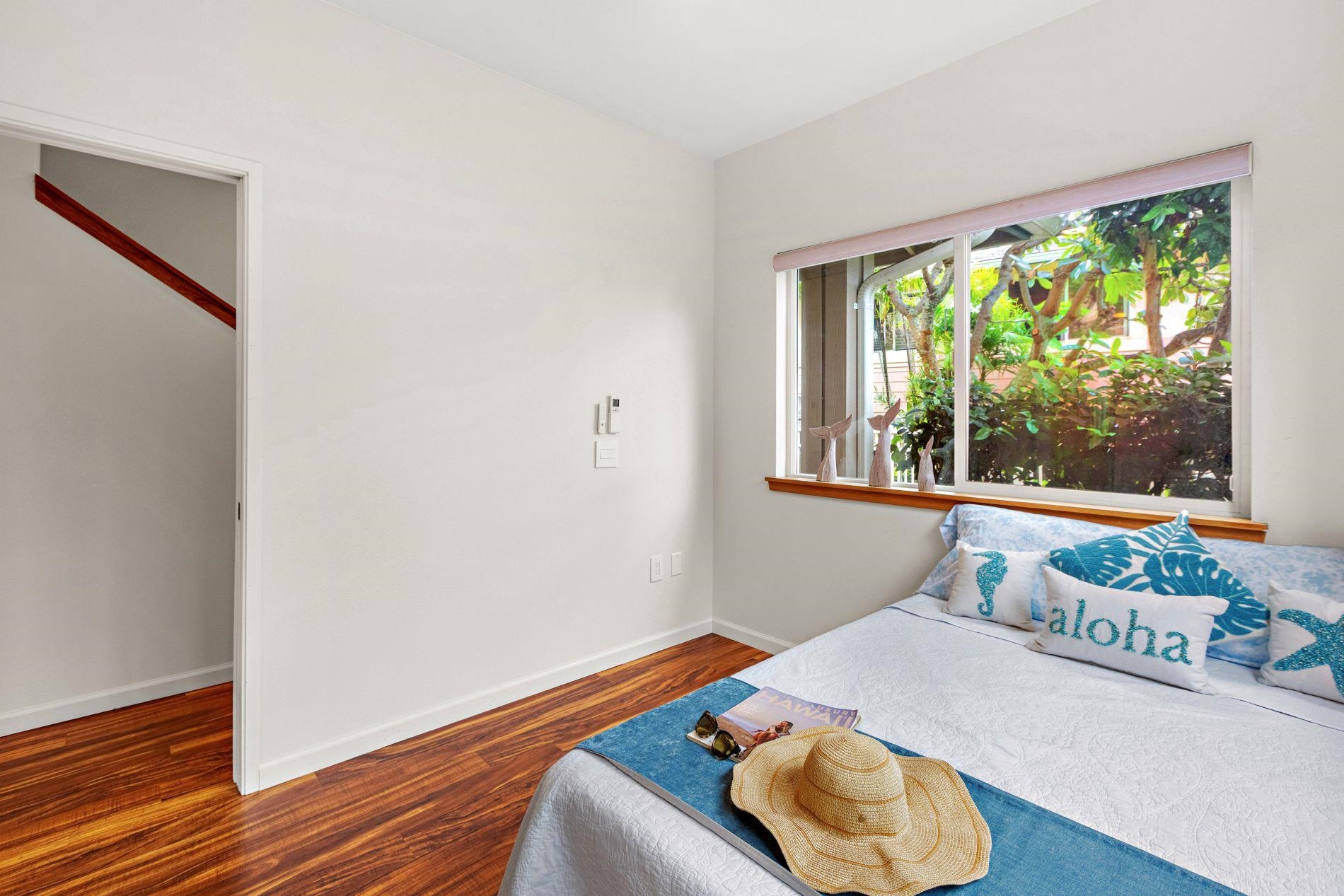 127 Punohu Lane, Unit 72 Lahaina, HI 96761 - Photo 20 of 43 a room with a bed and a window