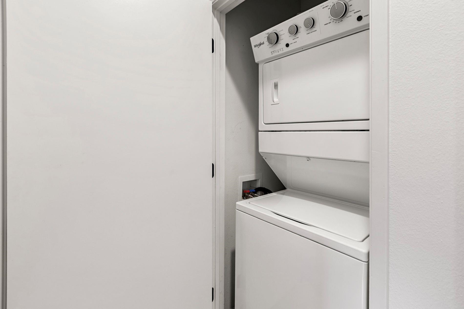 127 Punohu Lane, Unit 72 Lahaina, HI 96761 - Photo 27 of 43 a utility room with dryer and washer