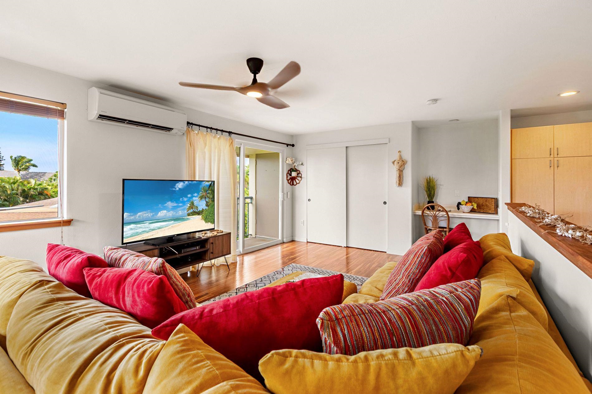 127 Punohu Lane, Unit 72 Lahaina, HI 96761 - Photo 38 of 43 a living room with furniture and a flat screen tv