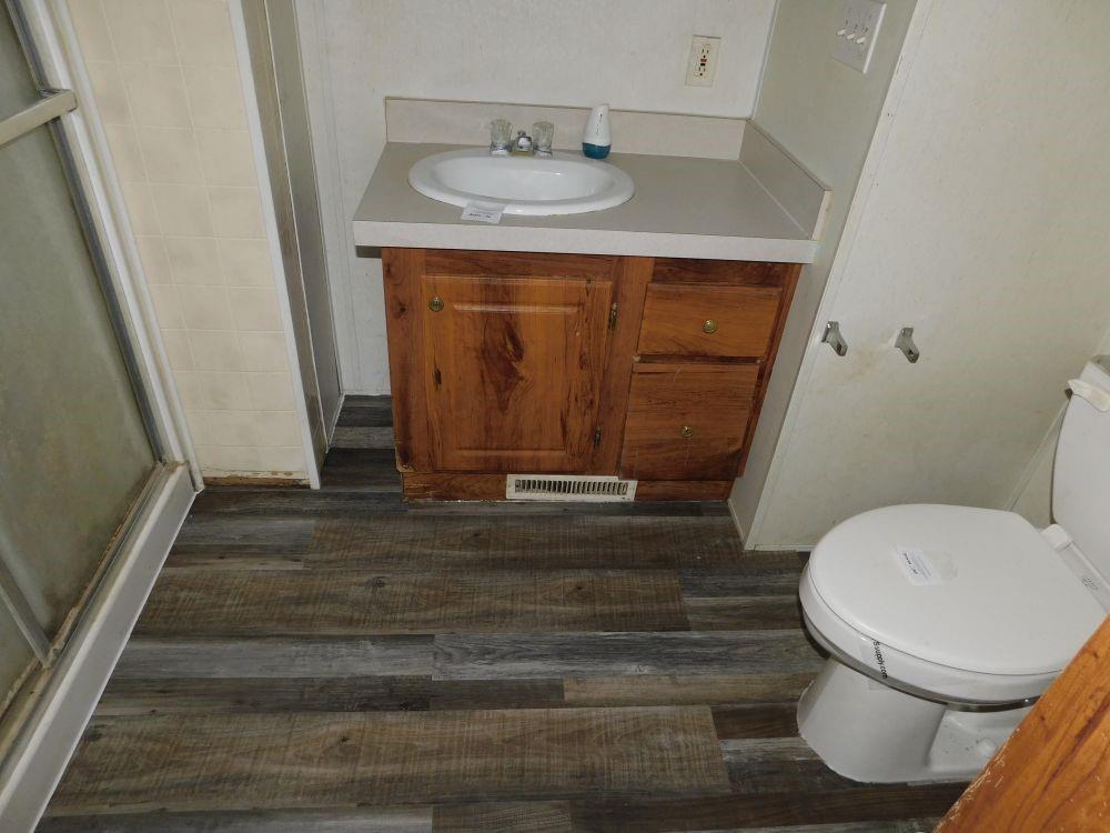 108 Valley Road Darlington, PA 16115 - Photo 4 of 10 a bathroom with a sink and a mirror
