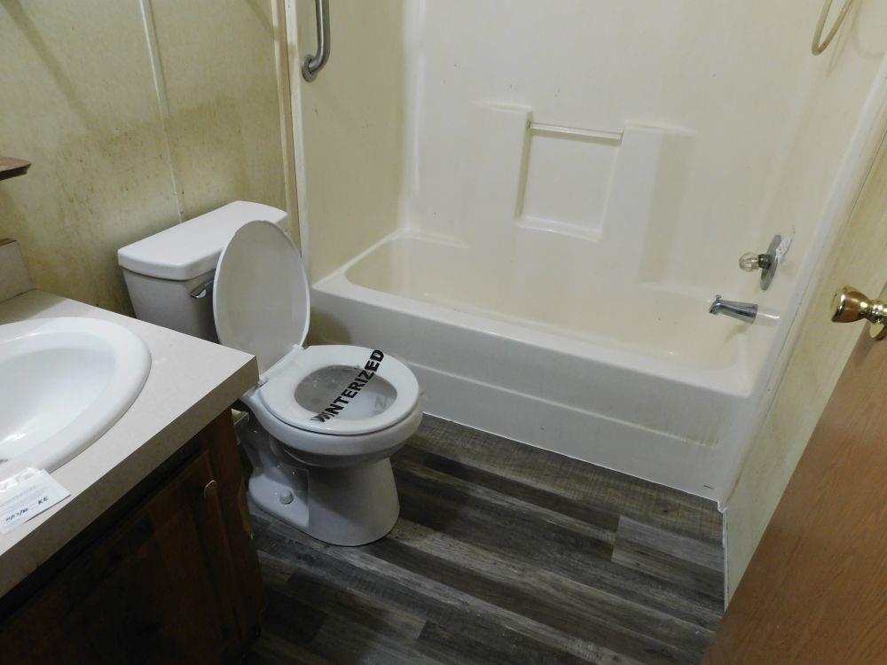 108 Valley Road Darlington, PA 16115 - Photo 5 of 10 a bathroom with a sink toilet and shower