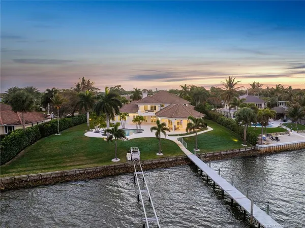 a view of a lake with a yard