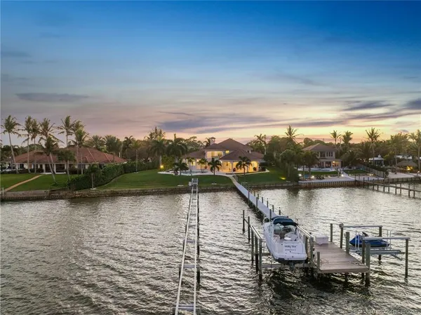 a view of a lake with sitting area