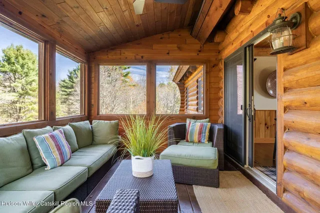 a view of entryway with wooden floor and stairs