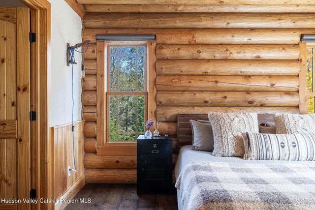 a view of a two chairs in the back yard