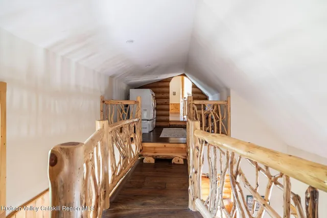 a living room with fireplace furniture and a flat screen tv