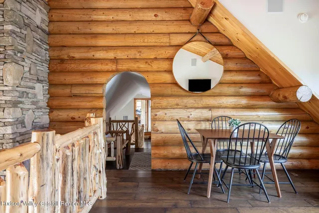 a living room with furniture and next to a window