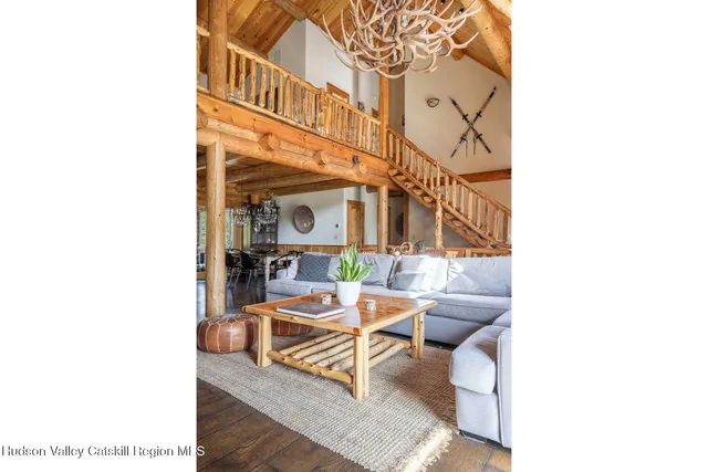 a kitchen with a sink a stove and cabinets