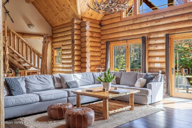 a kitchen with stainless steel appliances granite countertop a stove and cabinets