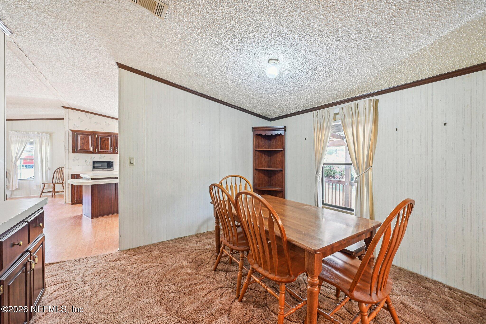 128 Sesame Street Middleburg, FL 32068 - Photo 22 of 66 Formal Dining Room