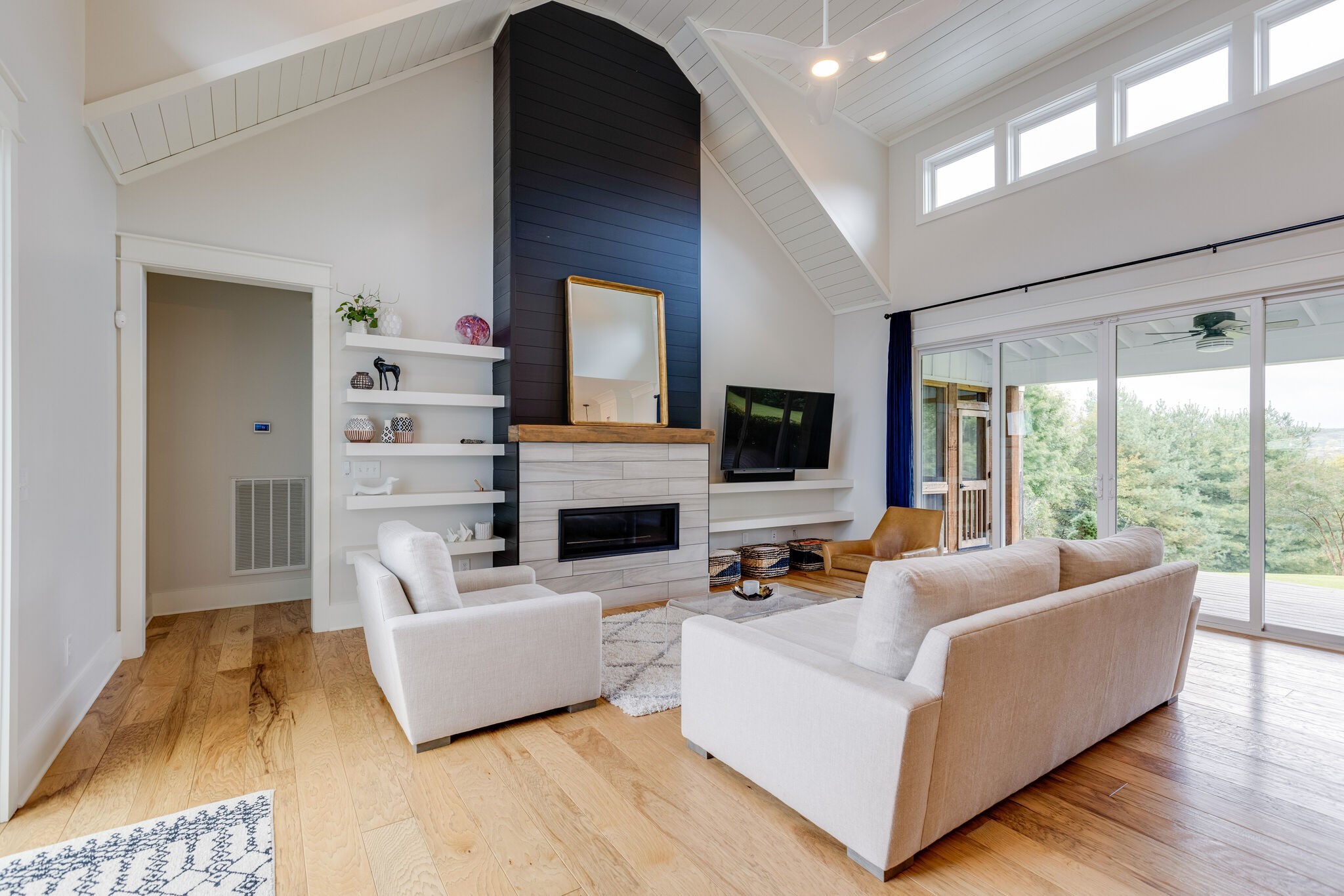 322 Springhouse Circle Franklin, TN 37067 - Photo 12 of 70 a living room with furniture fireplace and a large window