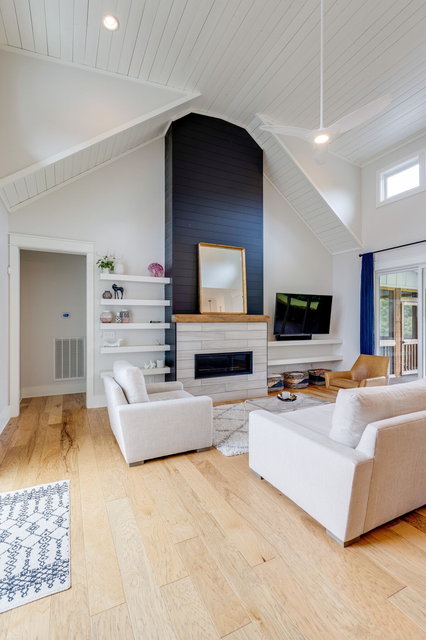 322 Springhouse Circle Franklin, TN 37067 - Photo 13 of 70 a living room with furniture and a flat screen tv
