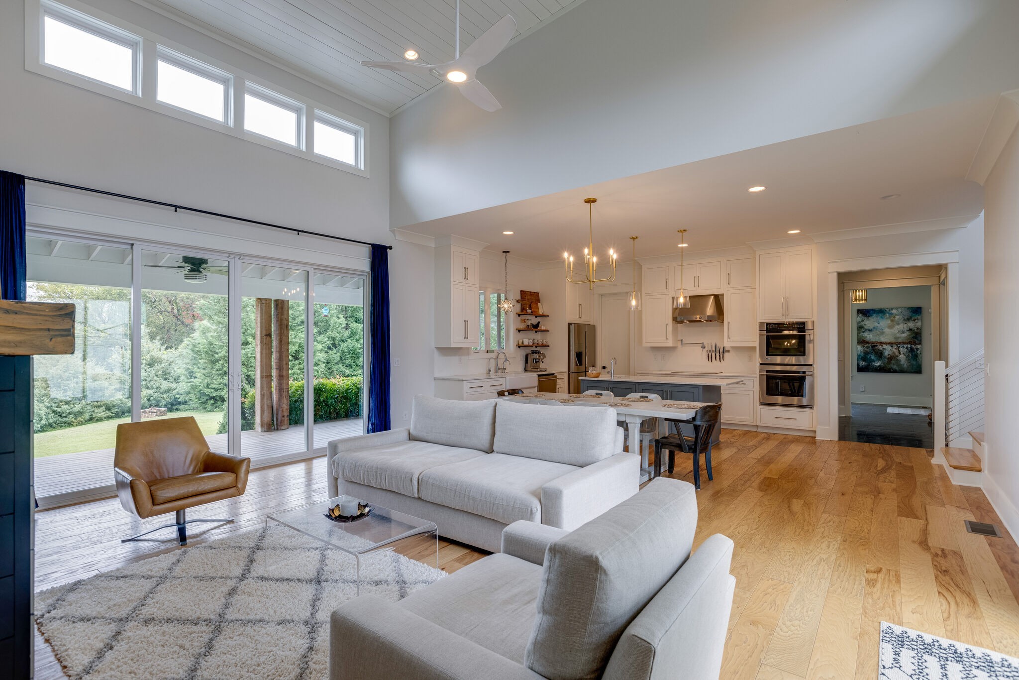 322 Springhouse Circle Franklin, TN 37067 - Photo 16 of 70 a living room with furniture and a large window