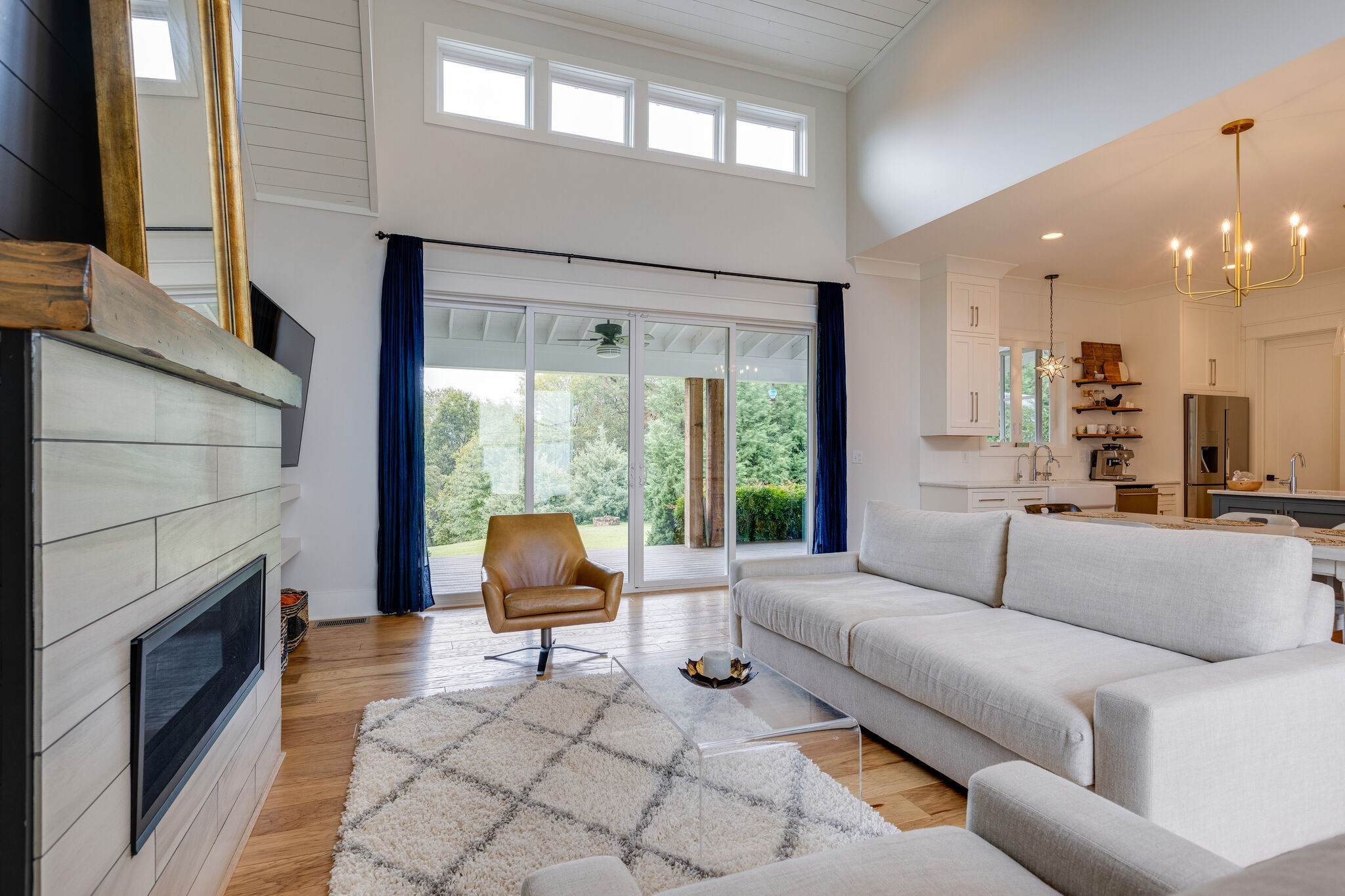 322 Springhouse Circle Franklin, TN 37067 - Photo 17 of 70 a living room with furniture and a fireplace