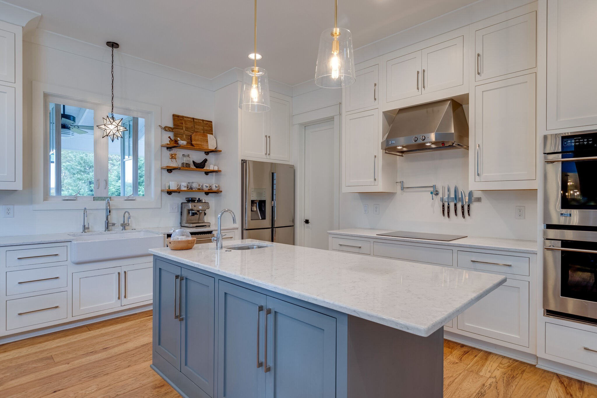 322 Springhouse Circle Franklin, TN 37067 - Photo 22 of 70 a kitchen with stainless steel appliances a sink stove and refrigerator