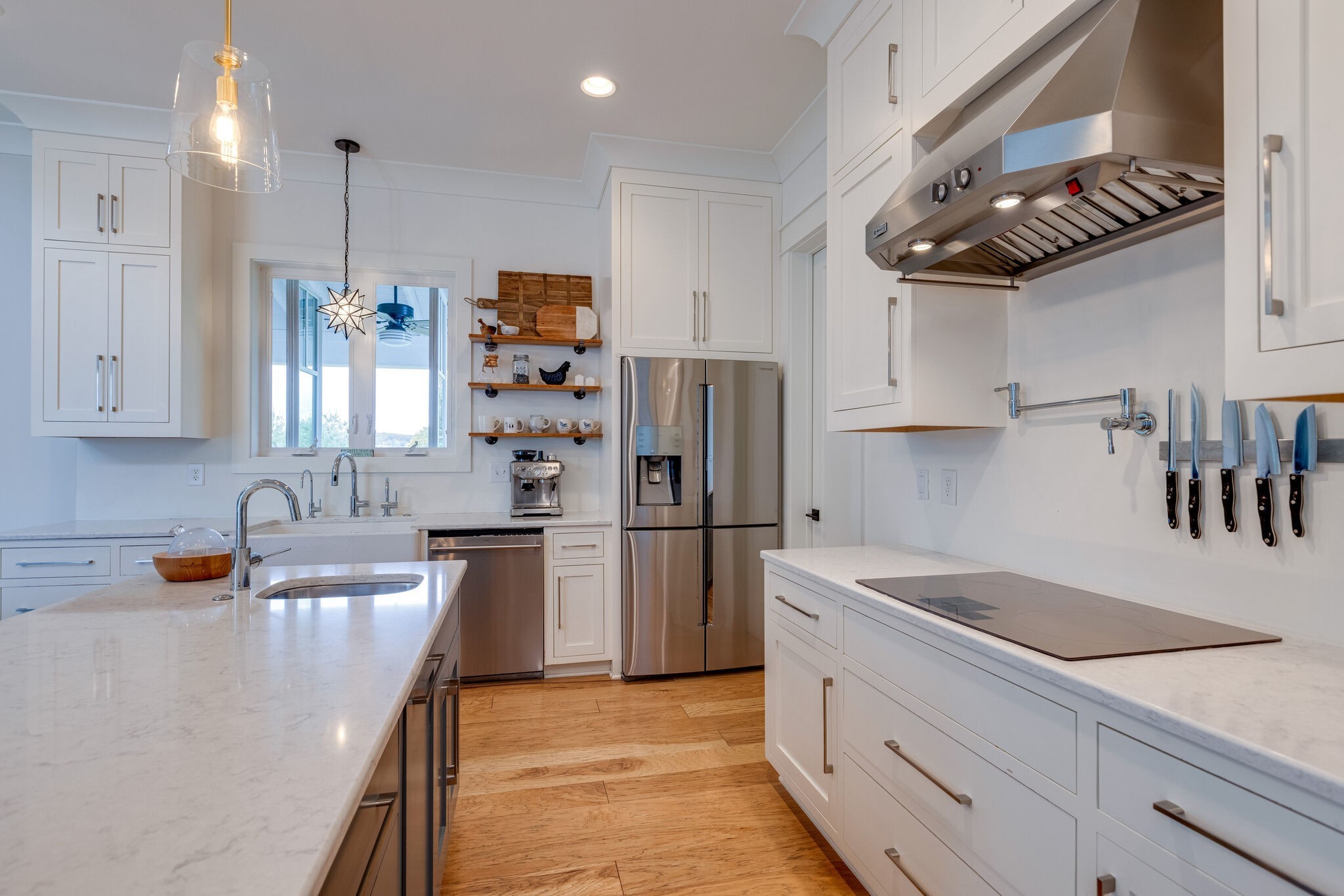 322 Springhouse Circle Franklin, TN 37067 - Photo 24 of 70 a kitchen with stainless steel appliances granite countertop a sink refrigerator and cabinets