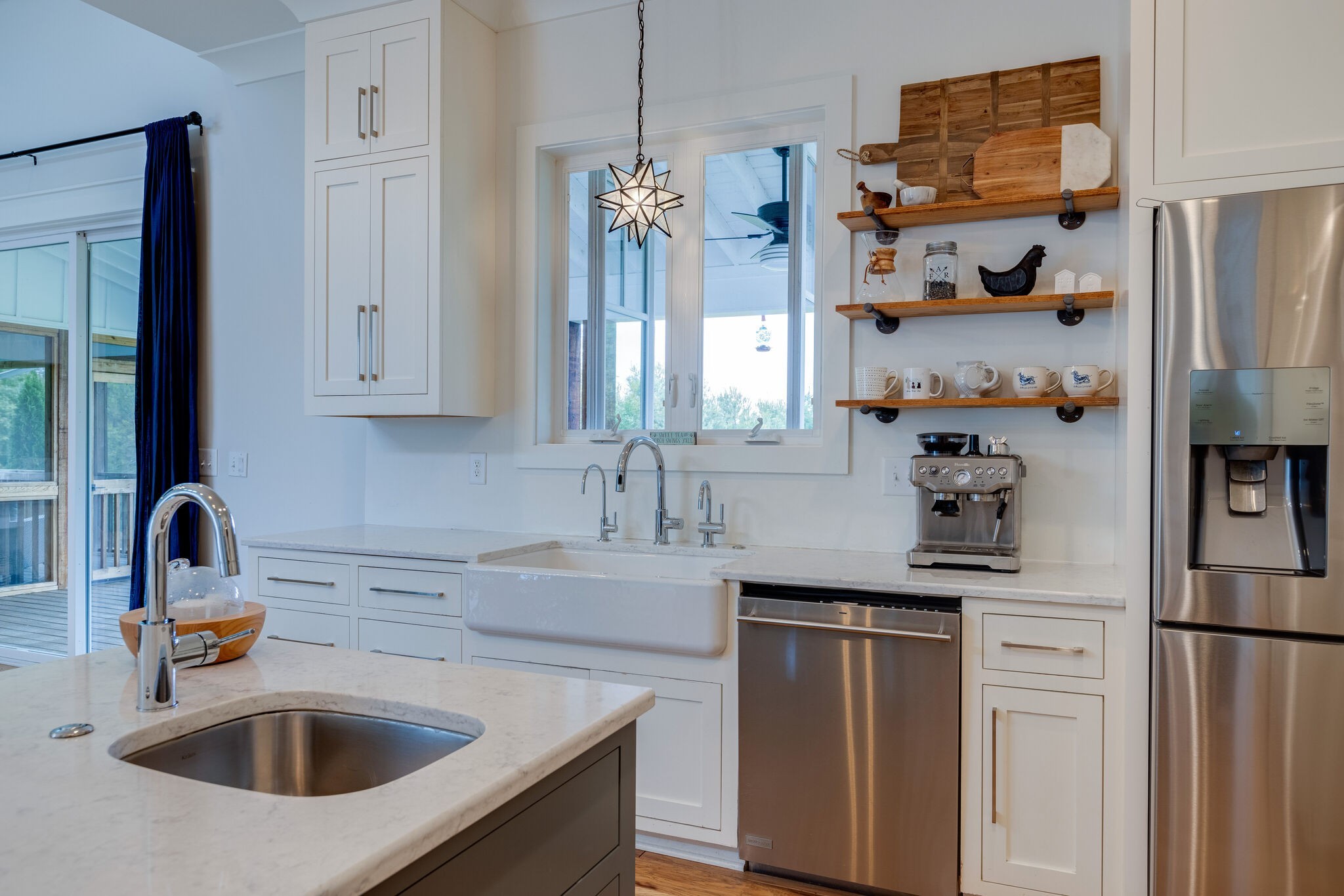 322 Springhouse Circle Franklin, TN 37067 - Photo 28 of 70 a kitchen with white cabinets and refrigerator