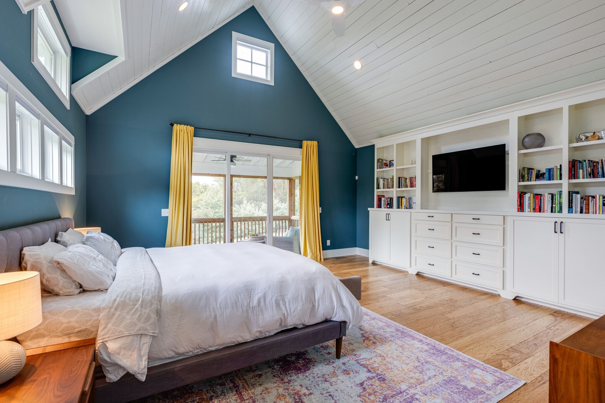 322 Springhouse Circle Franklin, TN 37067 - Photo 31 of 70 a bedroom with a bed and a flat screen tv