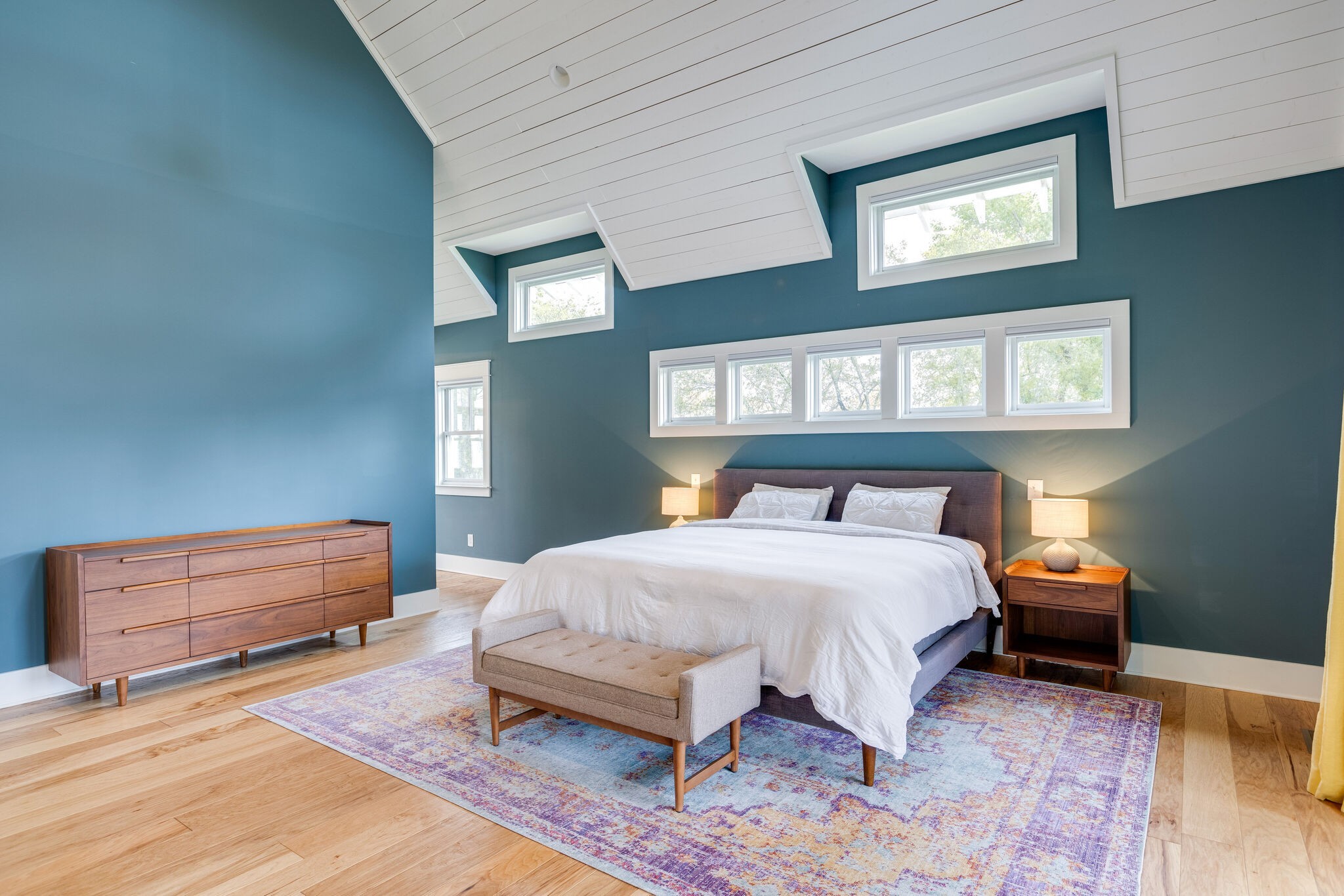 322 Springhouse Circle Franklin, TN 37067 - Photo 32 of 70 a bedroom with a bed lamp and a dresser