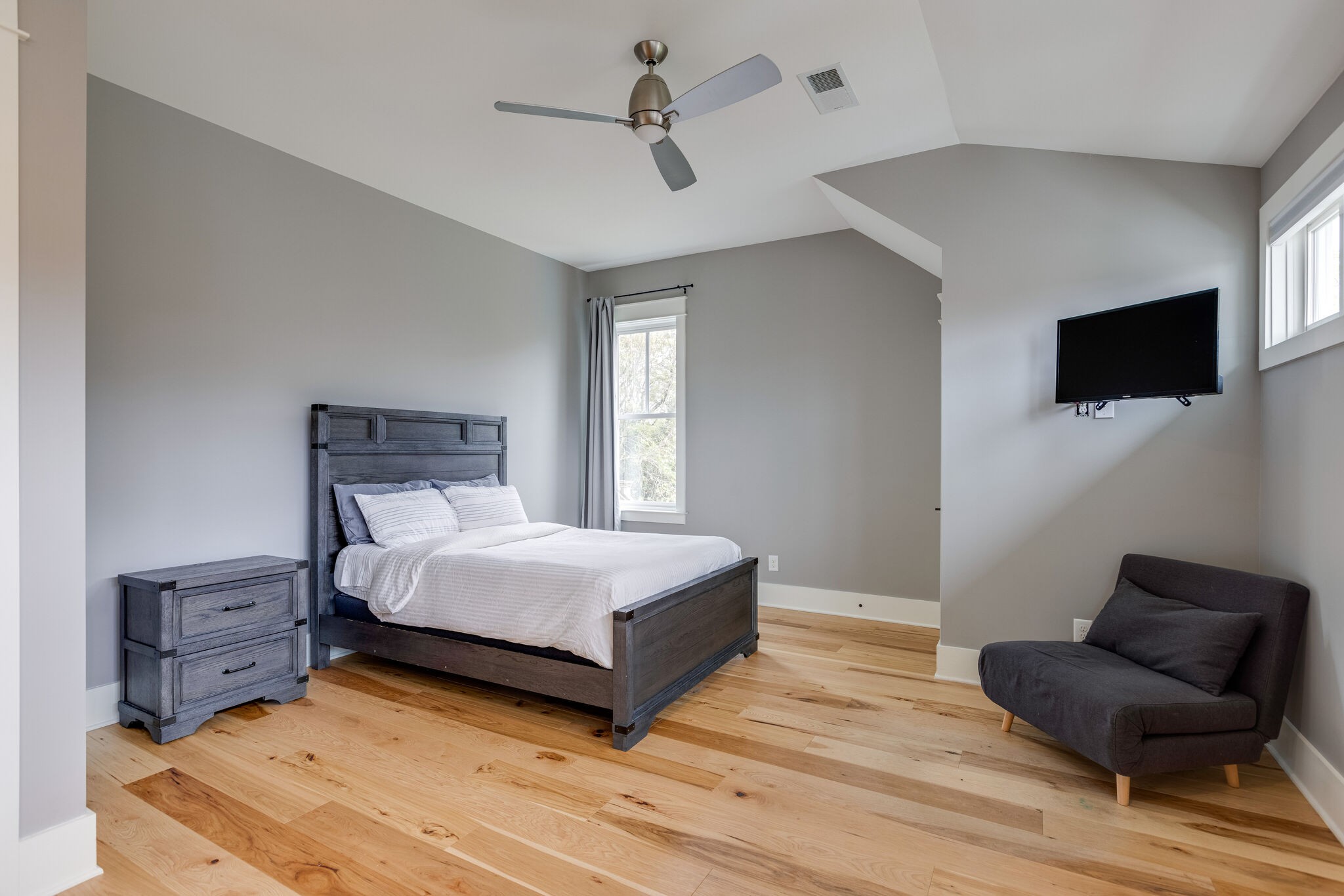 322 Springhouse Circle Franklin, TN 37067 - Photo 50 of 70 a bedroom with a bed window and a chair