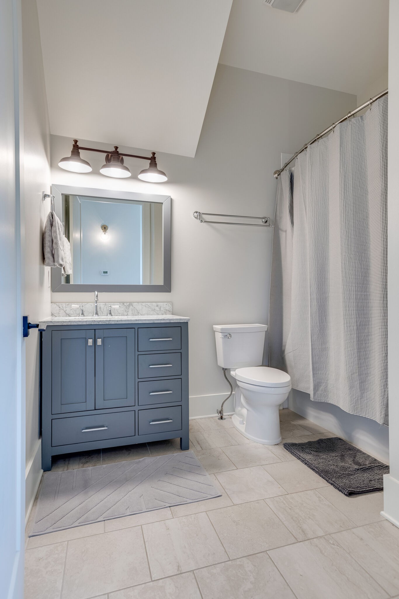 322 Springhouse Circle Franklin, TN 37067 - Photo 52 of 70 a bathroom with a granite countertop sink and a toilet