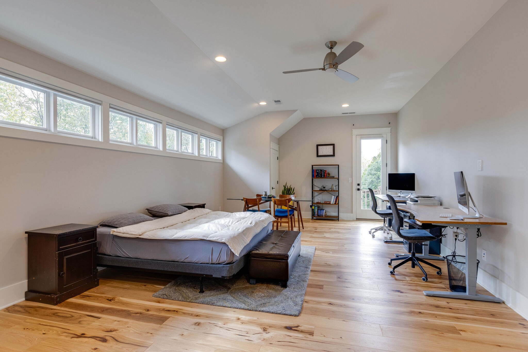 322 Springhouse Circle Franklin, TN 37067 - Photo 54 of 70 a bedroom with furniture and a wooden floor