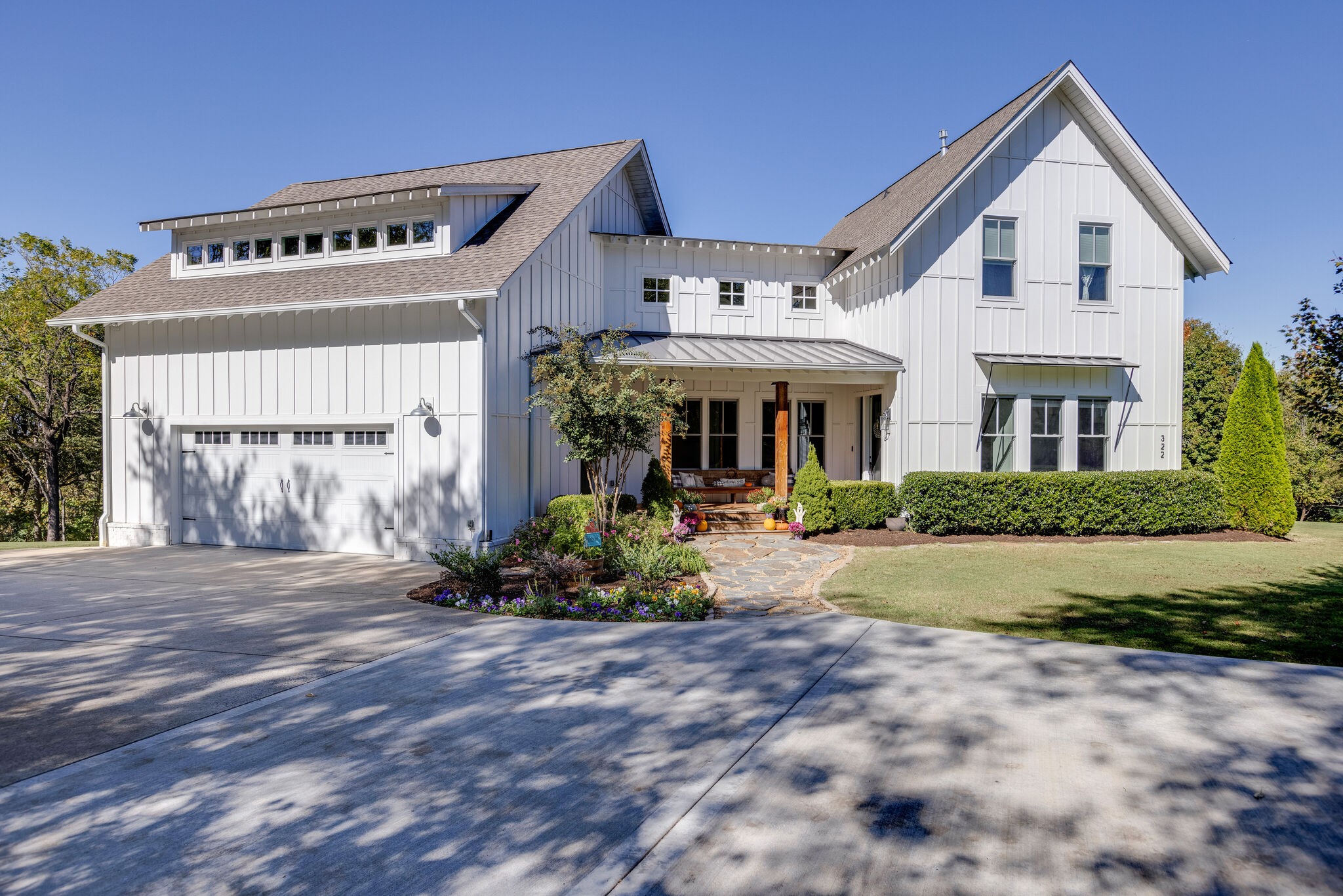 322 Springhouse Circle Franklin, TN 37067 - Photo 70 of 70 a front view of a house with a yard and outdoor seating