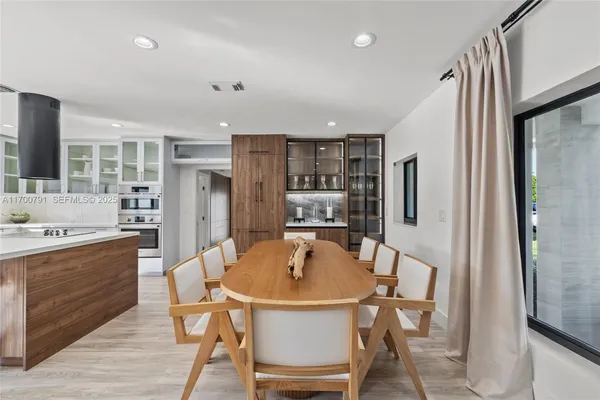 a view of a dining room with furniture