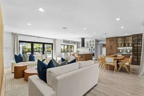 a living room with furniture and a table