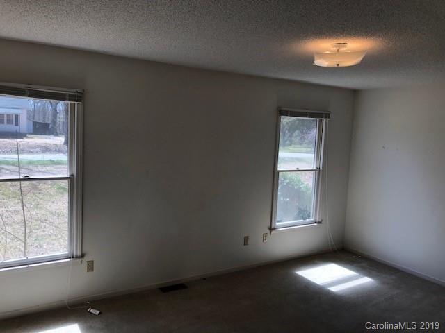 483 Shiloh Unity Road Lancaster, SC 29720 - Photo 12 of 22 an empty room with a window