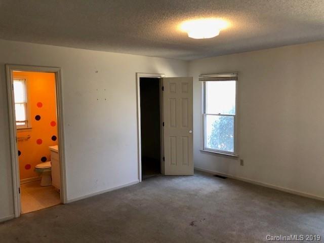 483 Shiloh Unity Road Lancaster, SC 29720 - Photo 13 of 22 an empty room with windows