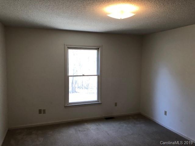 483 Shiloh Unity Road Lancaster, SC 29720 - Photo 14 of 22 an empty room with a window